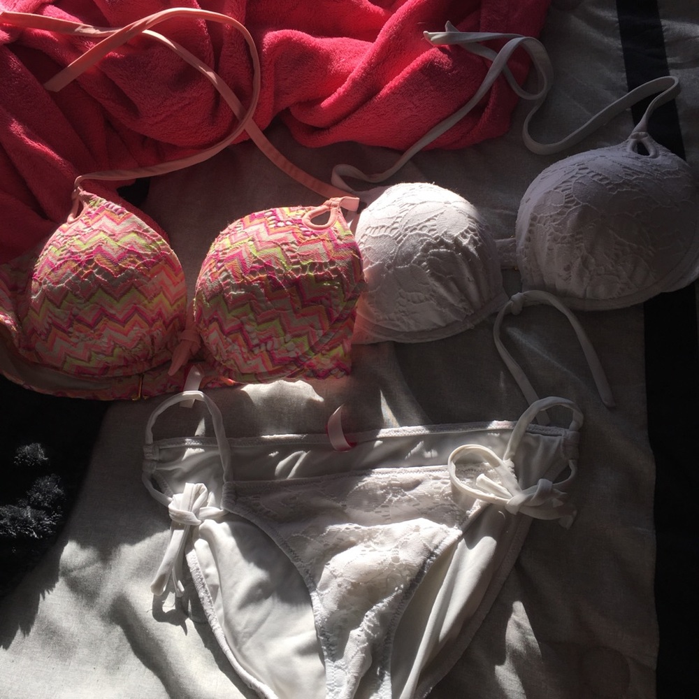 Two Victoria’s Secret bikini tops and 1 bottoms